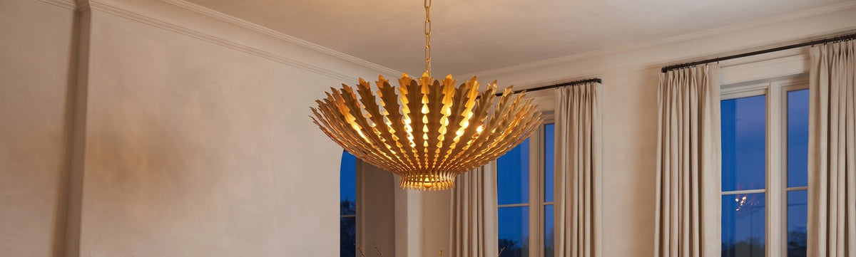 Alabaster pendant lights above a dining table