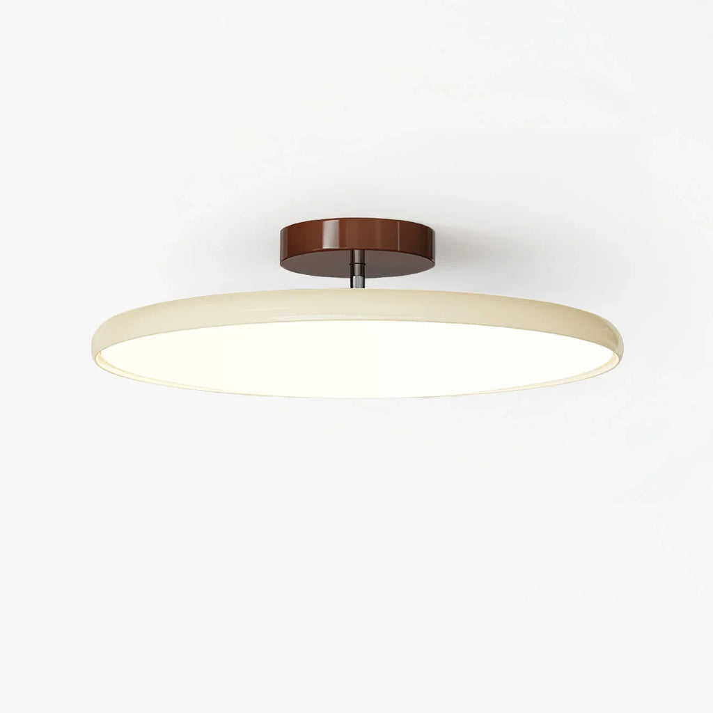 Tilting disc ceiling light, in beige