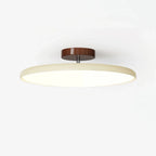 Tilting disc ceiling light, in beige