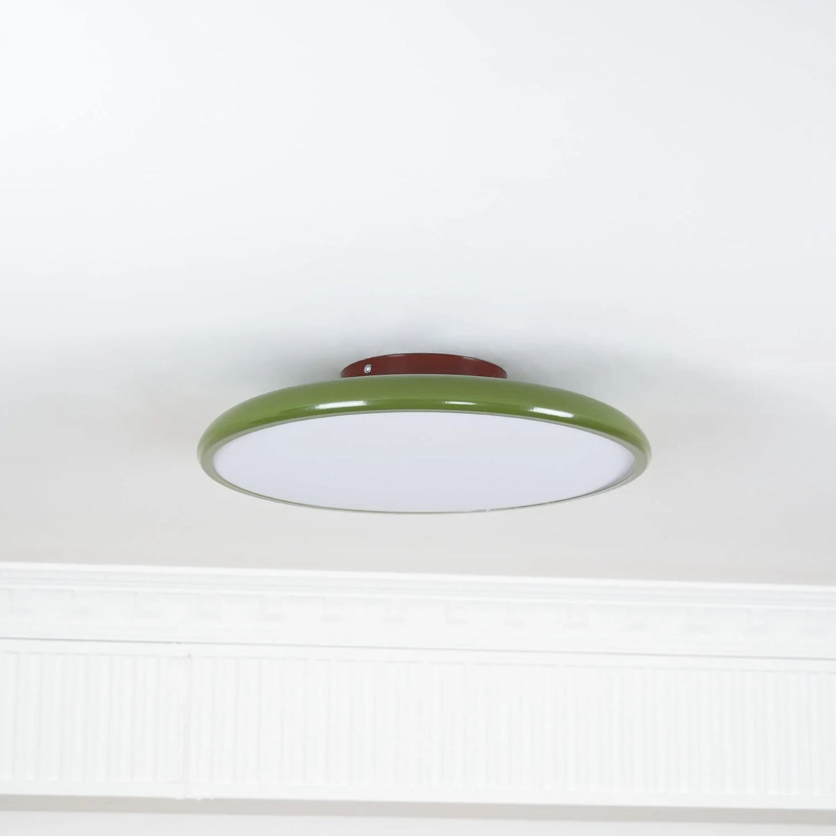 Tilting disc ceiling light, in green