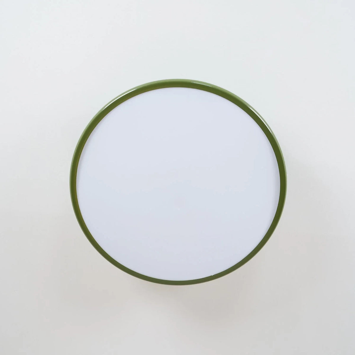 Tilting disc ceiling light, in green