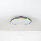 Tilting disc ceiling light, in green