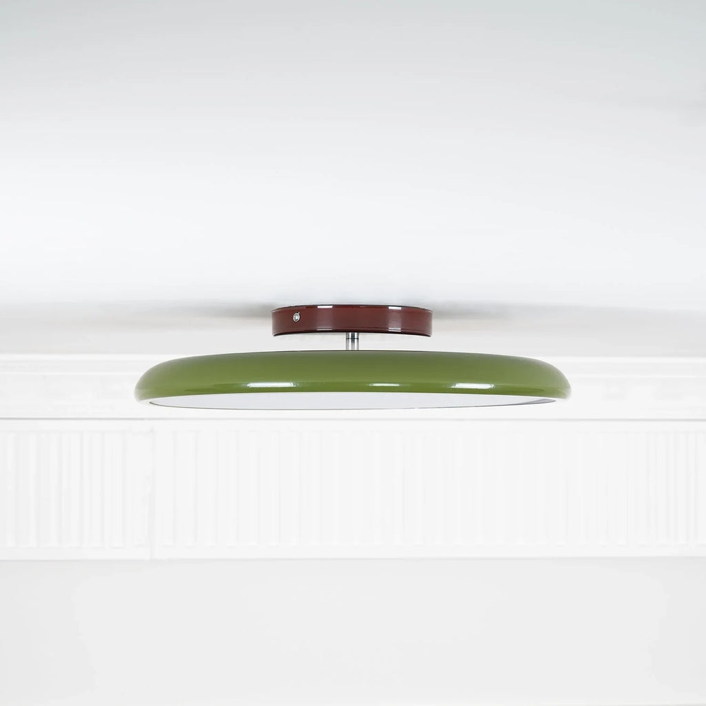 Tilting disc ceiling light, in green