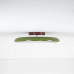 Tilting disc ceiling light, in green