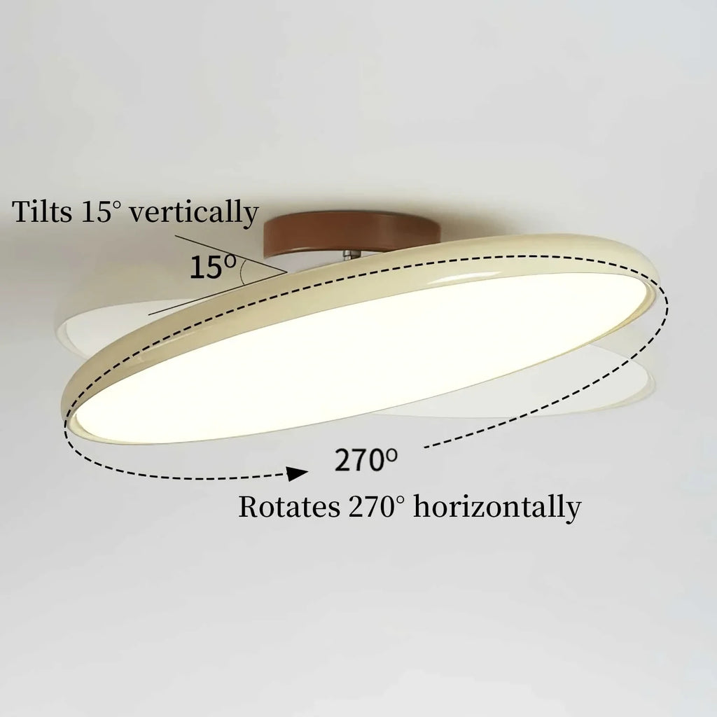 Tilting disc ceiling light, showing the tilt and rotation