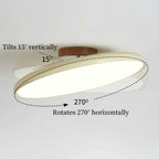 Tilting disc ceiling light, showing the tilt and rotation