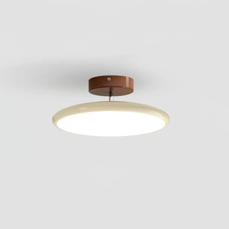 Tilting disc ceiling light, in beige