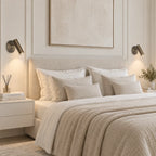 Adjustable reading wall light, a pair beside a bed