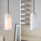 Alabaster cylinder pendant light, lit and unlit