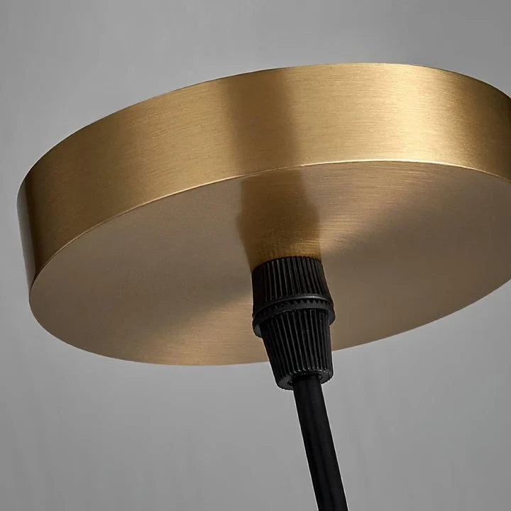 Alabaster cylinder pendant light, close-up of the ceiling plate
