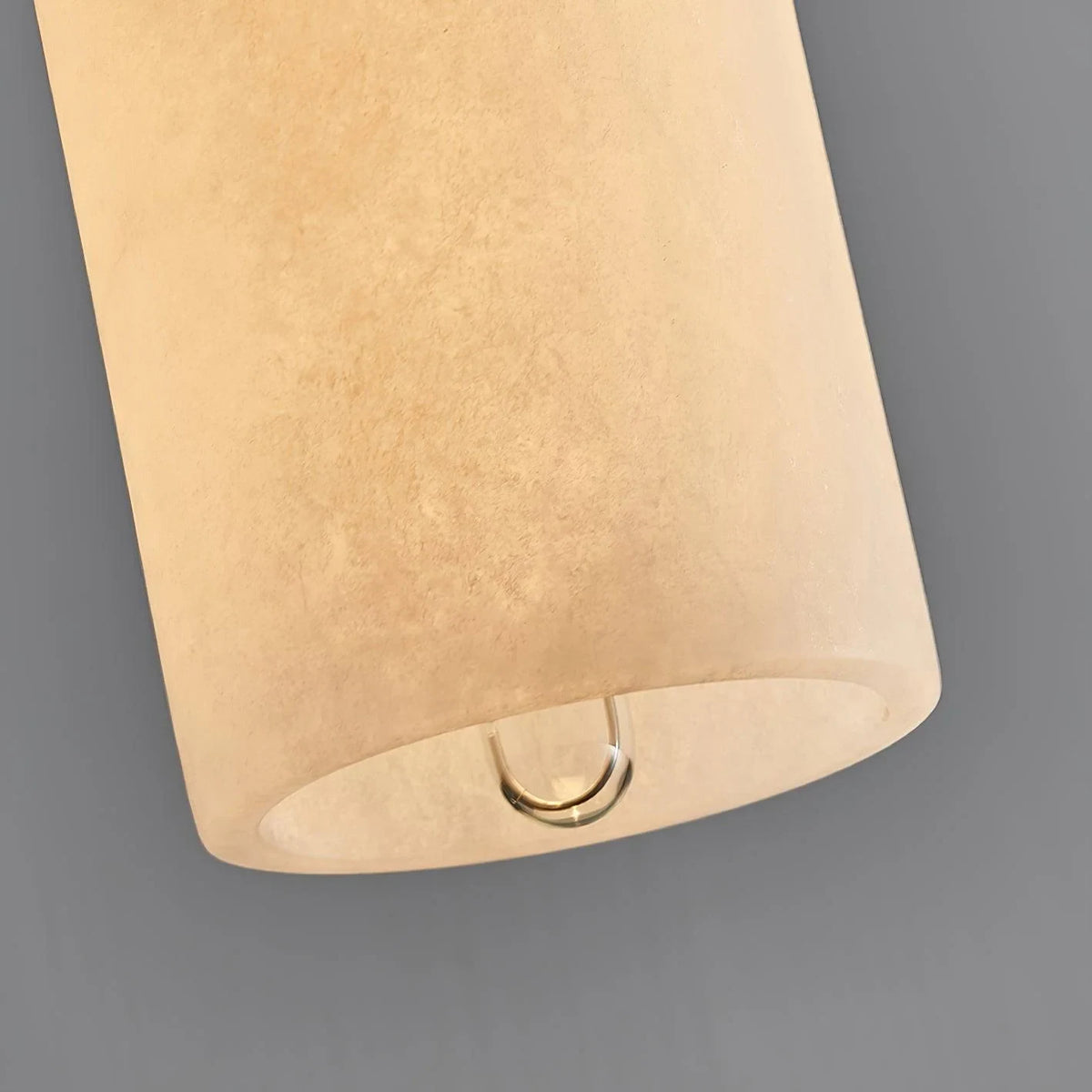 Alabaster cylinder pendant light, close-up from below