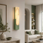 Alabaster panel wall light, in green, lit in a living room