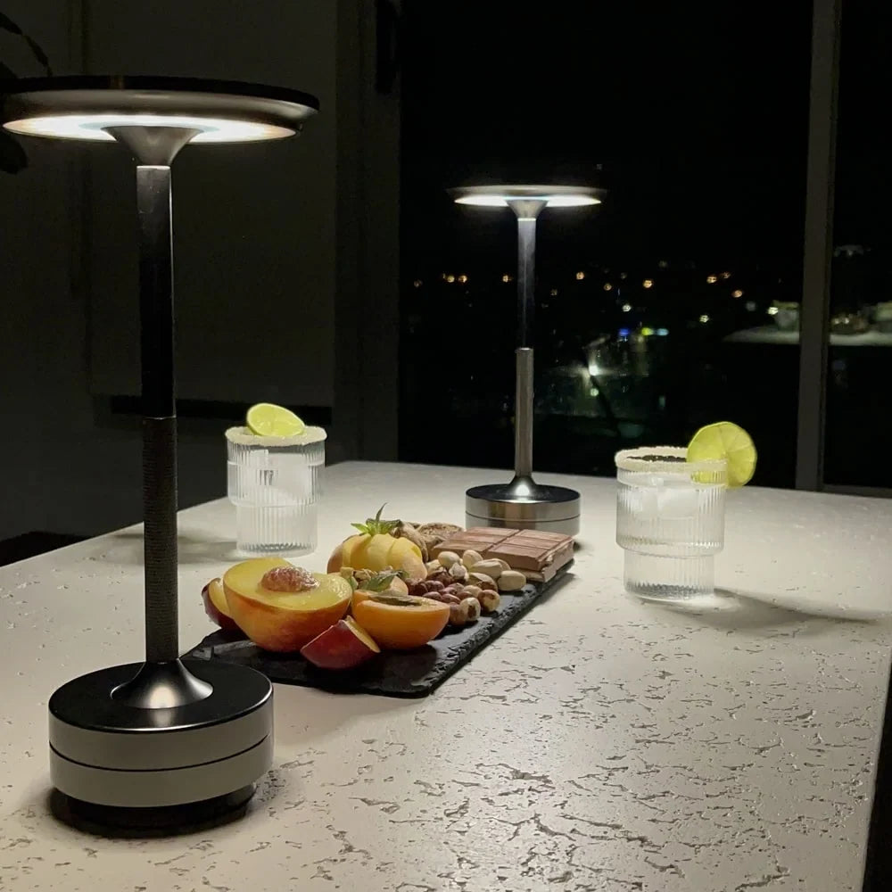 Aluminium cordless table lamp, a pair on a kitchen worktop