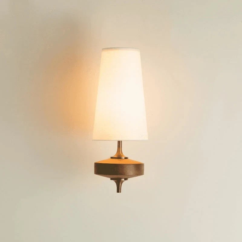 Walnut and antique brass wall light, single, white shade, lit