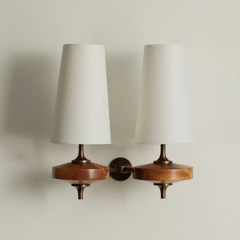 Walnut and antique brass wall light, double, with white shades