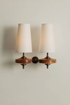 Walnut and antique brass wall light, double, white shades
