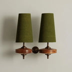 Walnut and antique brass wall light, double, with green shades