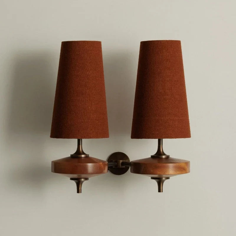 Walnut and antique brass wall light, double, with red shades