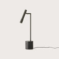 Articulated LED reading table lamp, black marble base, on its marble base
