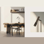 Articulated LED reading table lamp, black marble base, on a desk