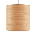 Large ash veneer drum pendant, on a plain background