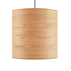 Large ash veneer drum pendant, on a plain background