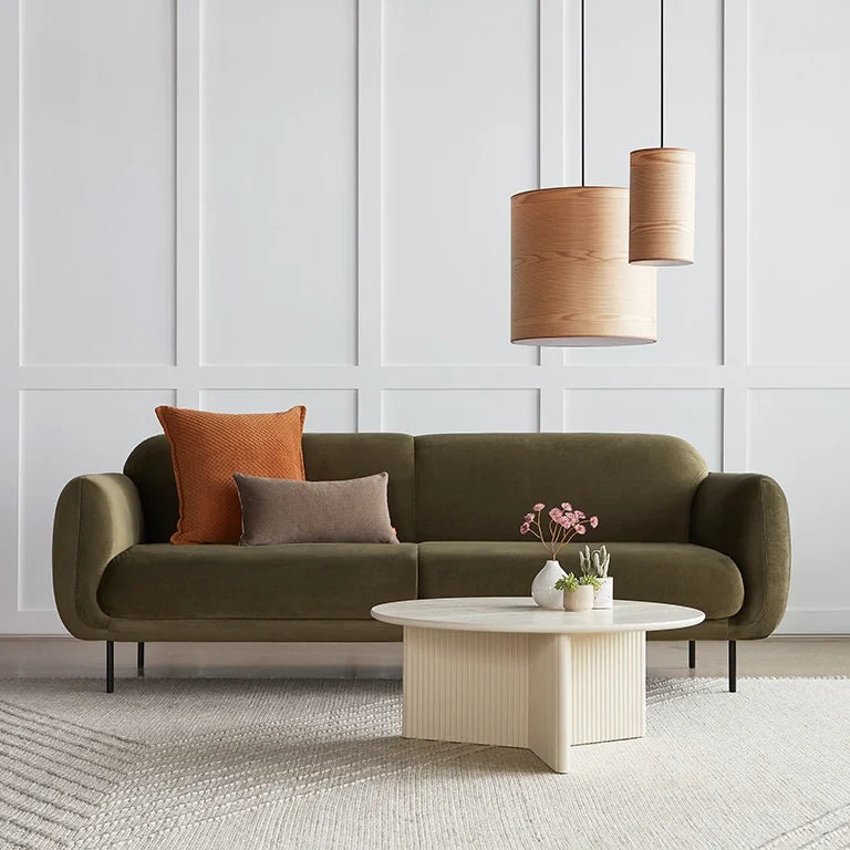 Small ash veneer drum pendant, in a living room