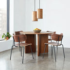 Small ash veneer drum pendant, above a small dining table