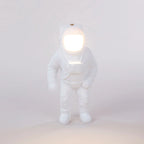 Astronaut cordless table lamp in white resin, lit, front view