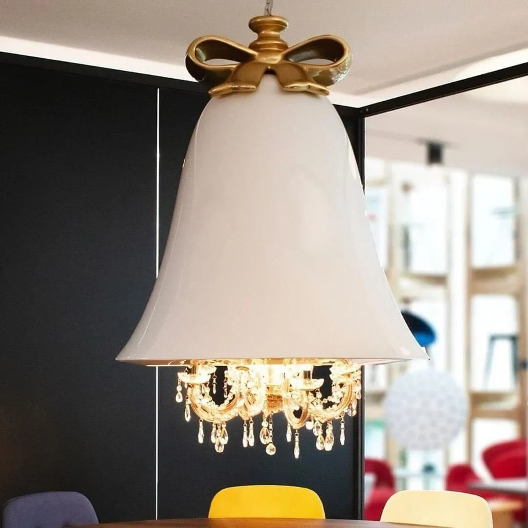 Bell pendant chandelier, in white above a table