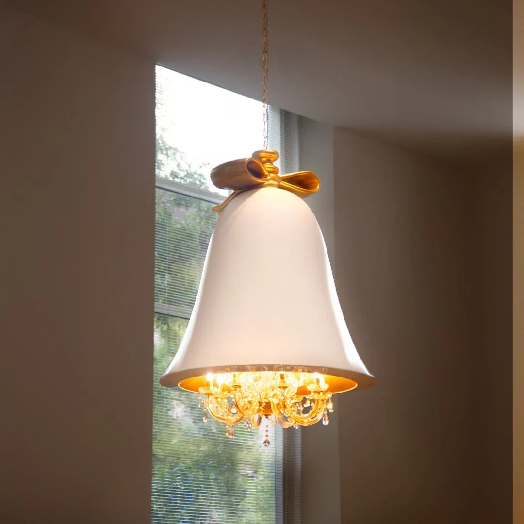 Bell pendant chandelier, in white by a window
