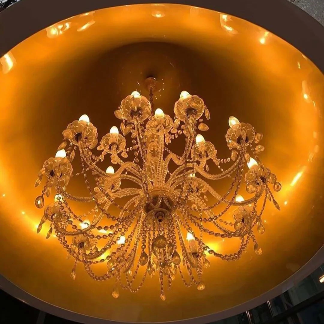 Bell pendant chandelier, lit chandelier inside the bell from below