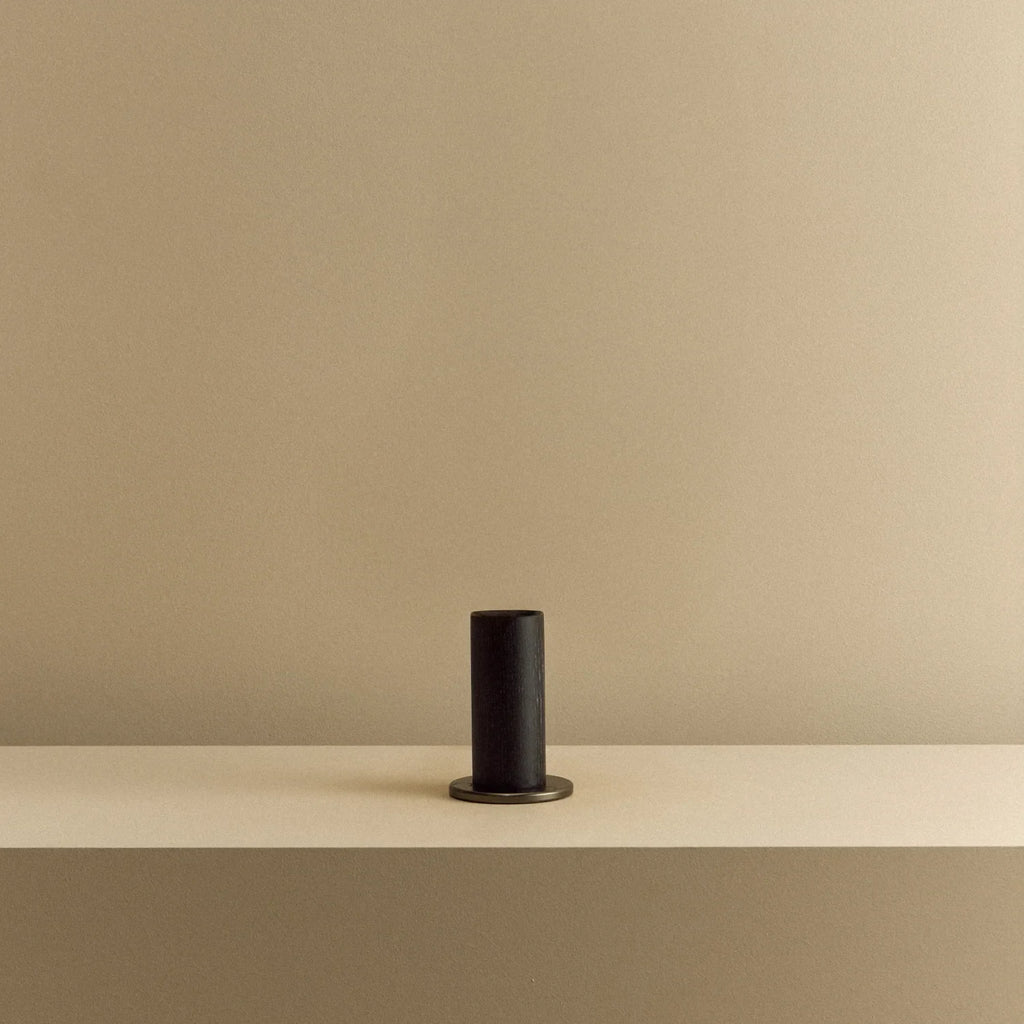 Blackened oak bulb holder table lamp, empty, on a shelf