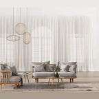 Bowed rod cage LED pendant, grouped above a living room