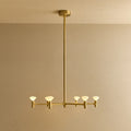 Branching brass chandelier, lit, medium