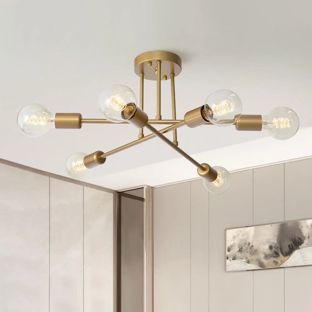 Brass sputnik semi-flush ceiling light, lit with globe bulbs
