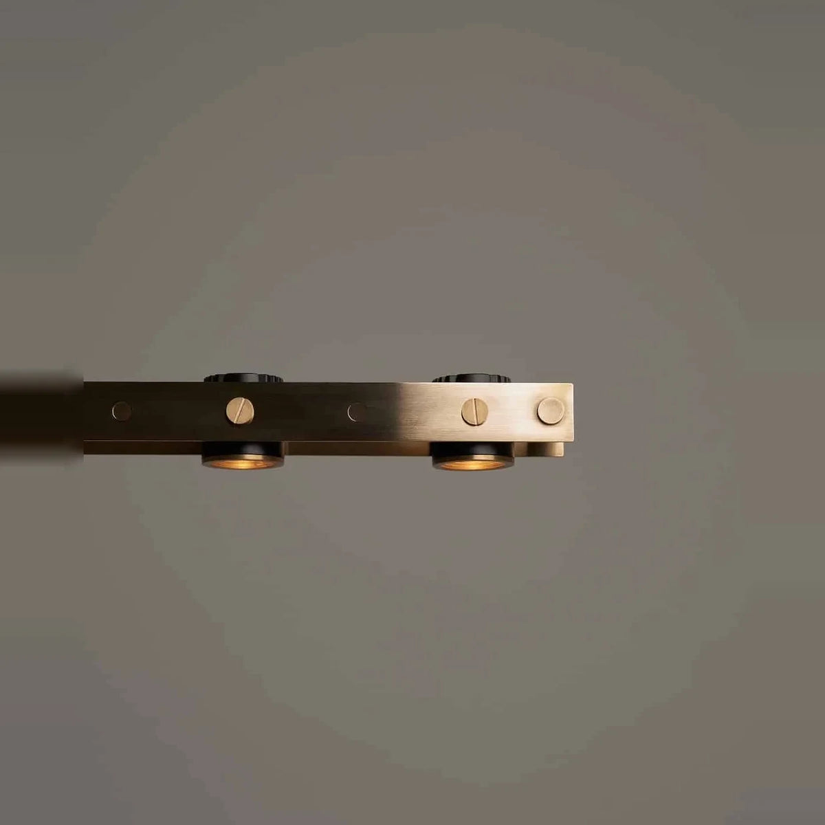 Brass track LED pendant, close-up of the brass bar