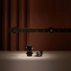 Brass track LED pendant, spots on a table