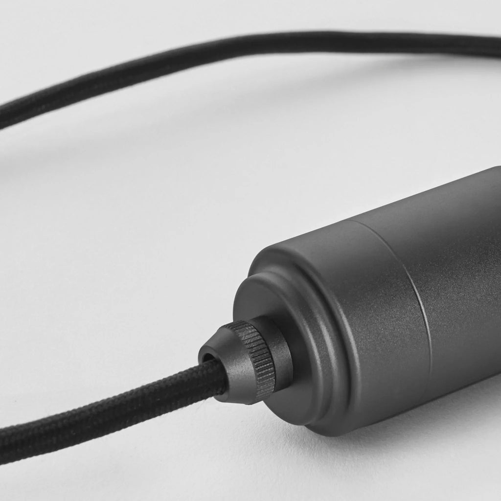 Broad dome matte white glass pendant, graphite, close-up of the graphite holder