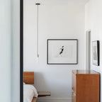 Cast metal hexagonal pendant, in a bedroom