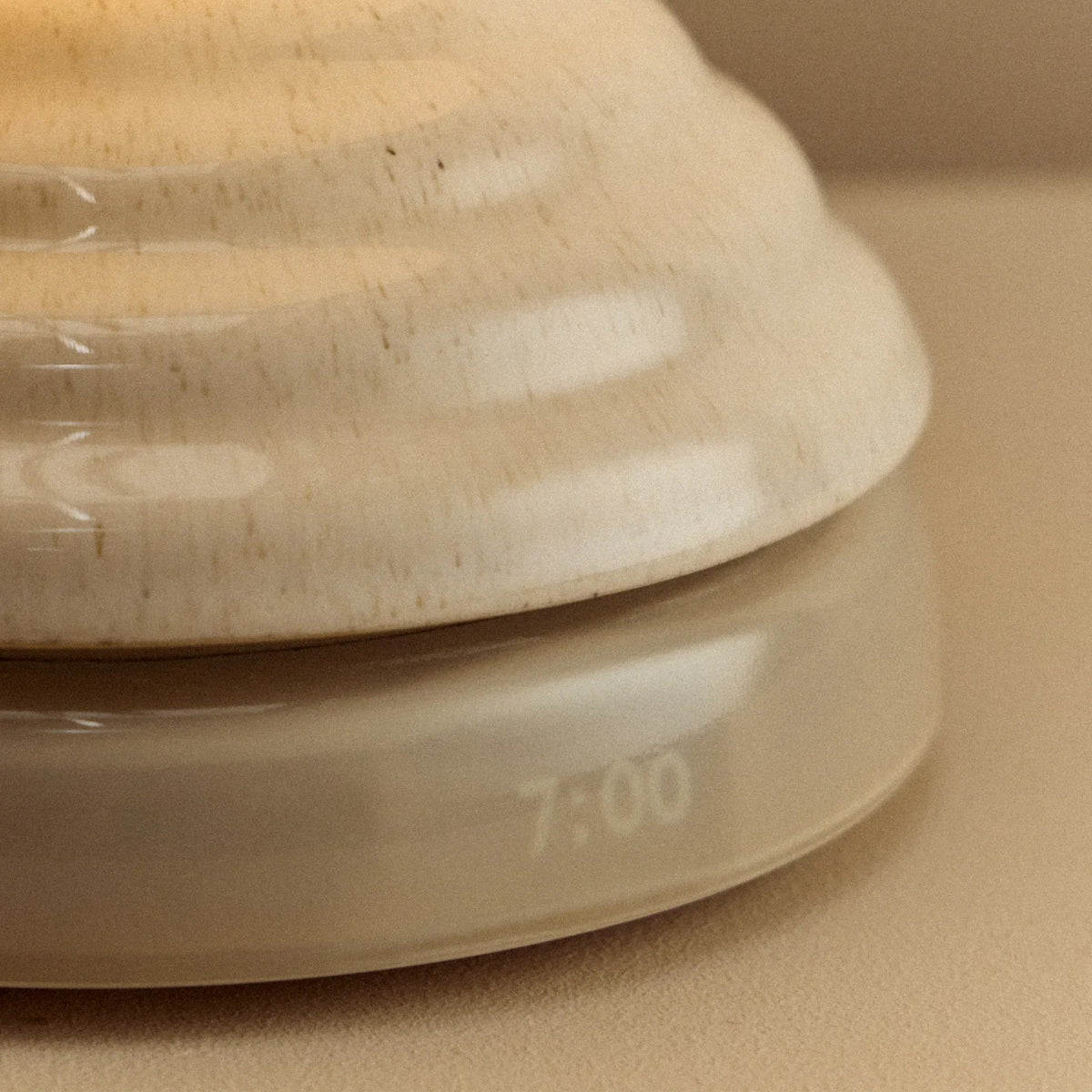 Ceramic wake light lamp pair, close-up of the glaze and time display