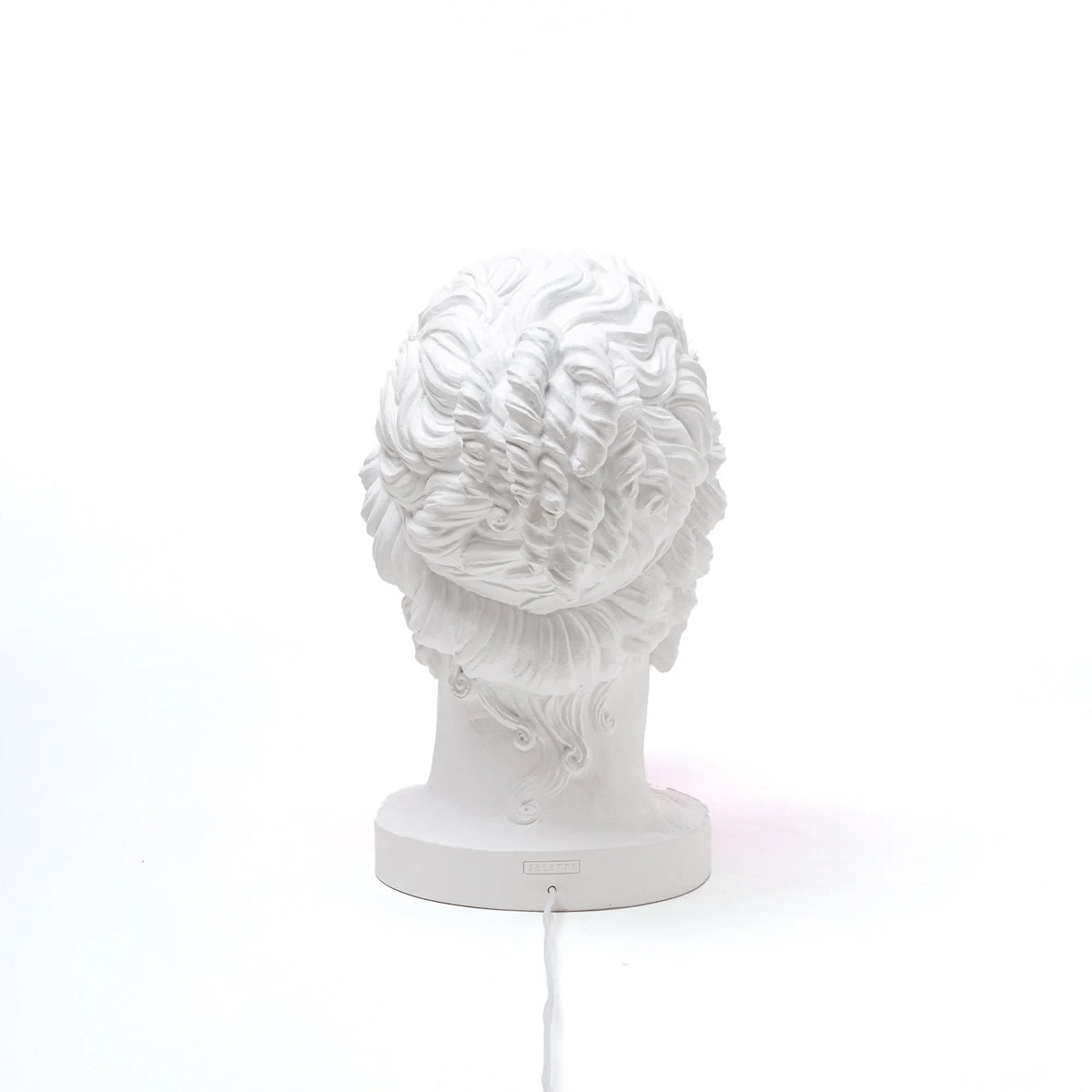 Classical bust table lamp with a pink bubblegum bubble, back view