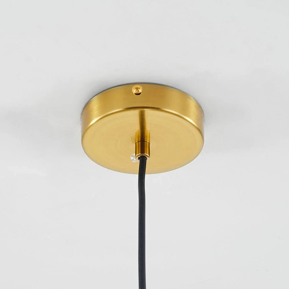 Clear or amber glass globe pendant, ceiling canopy detail