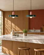 Two-tone disc pendant light, a pair above a kitchen island