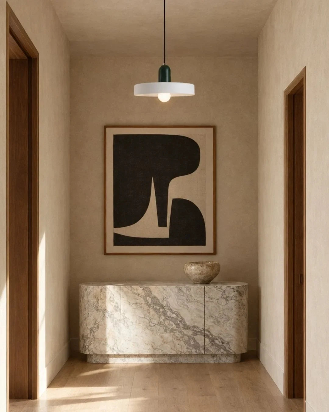 Two-tone disc pendant light, in white and green in a hallway