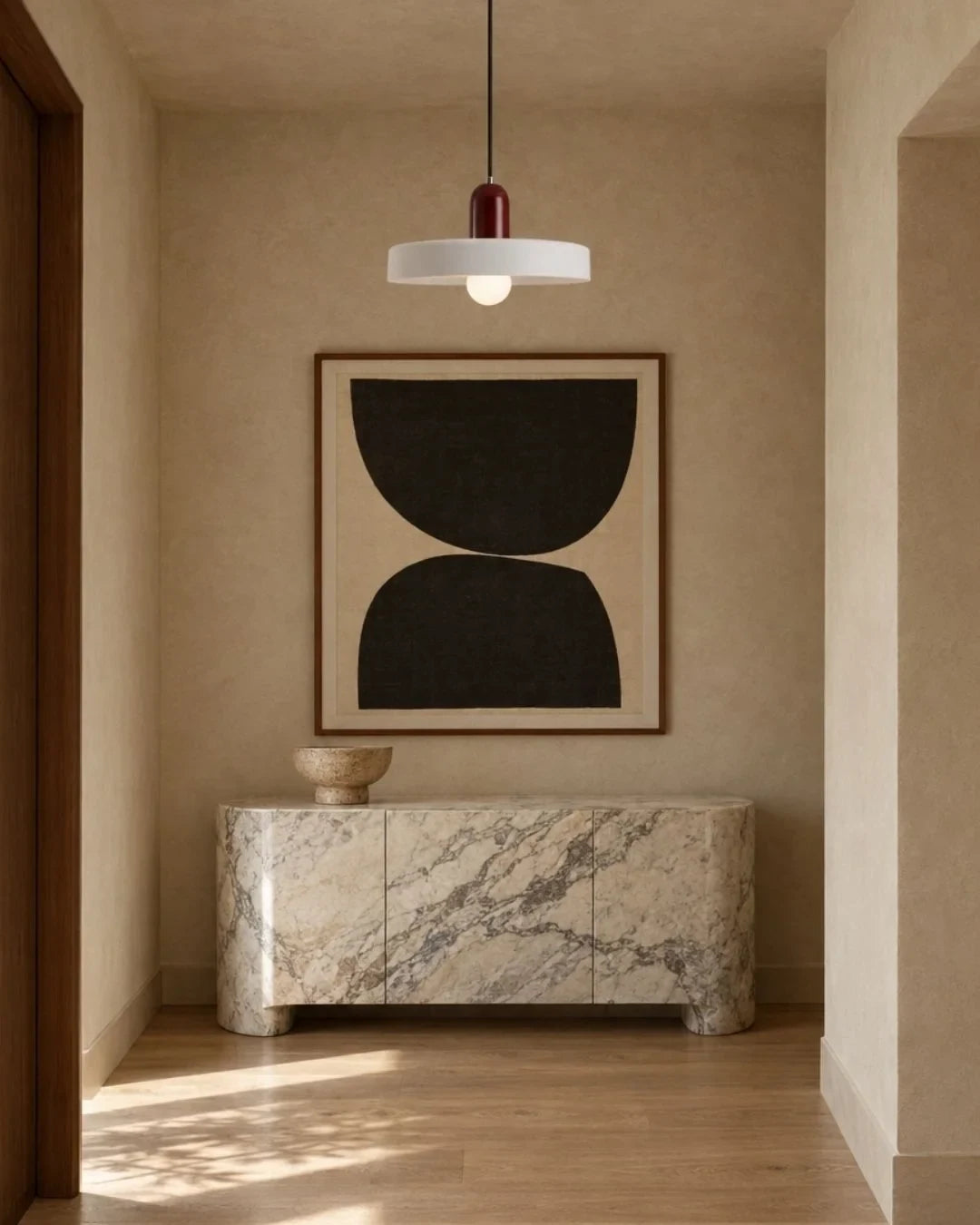 Two-tone disc pendant light, in white in a hallway