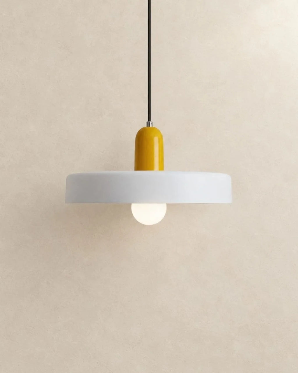 Two-tone disc pendant light, with a yellow cap and white shade