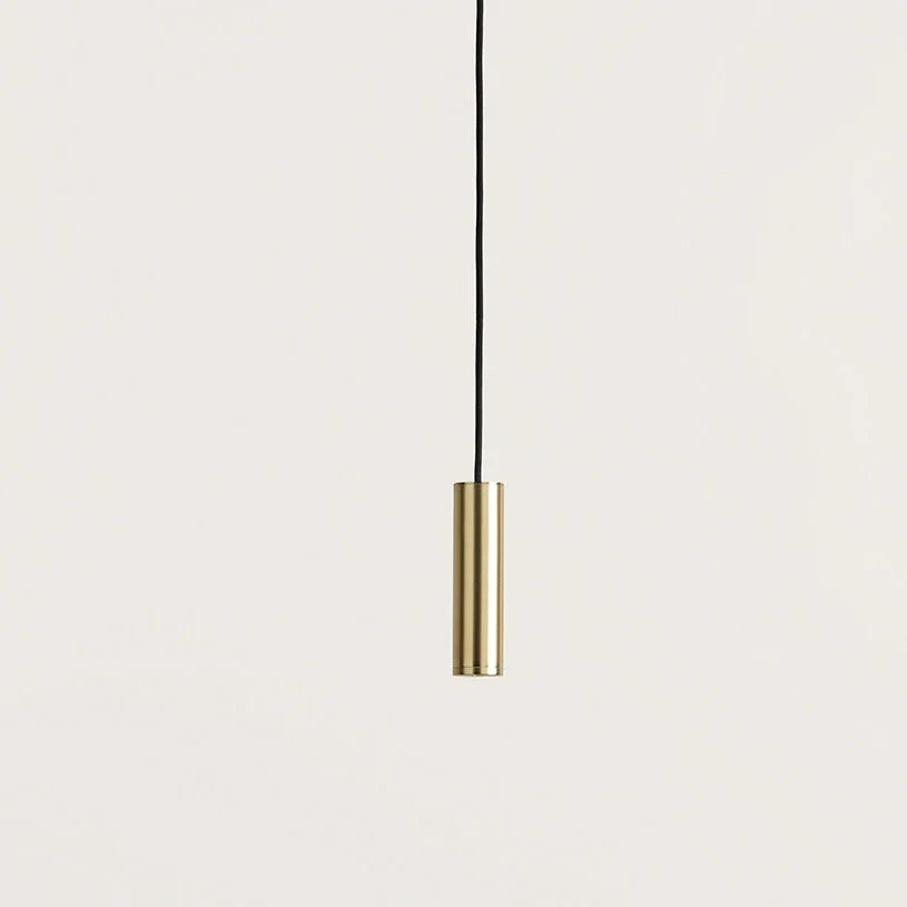 Compact cylinder LED pendant, close-up of the brass body
