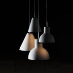 Concrete bell pendant, grouped with other concrete shades