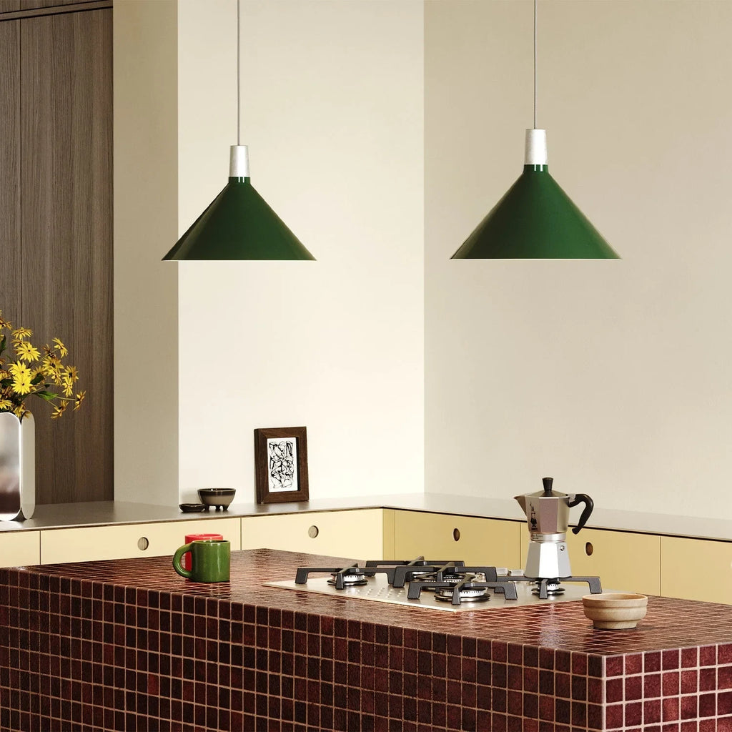 Medium dark green steel pendant with matt white globe bulb, two above a kitchen island